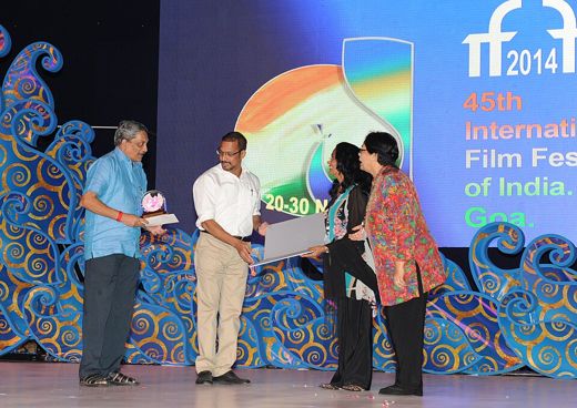 Presenting the Silver Peacock award with Manohar Parrikar, IFFI 2014